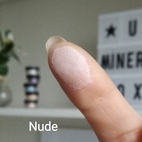 Heller Swatch of Nude on a fingertip