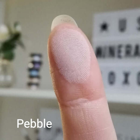 Matter Swatch of Pebble on a fingertip